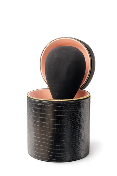 Moxi Loxi Voyage portable wig styling stand stored inside the protective travel case for human hair wigs and toppers.