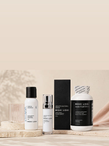 Pure Wash, Growth Factors+ Serum, and Hair Fortify+ arranged as the MOXI LOXI guided scalp regimen for mobile.