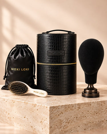 Moxi Loxi Voyage four-piece wig and topper care system with black travel case, storage bag, styling stand and brush