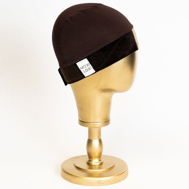 No-Slip Grip Cap by Moxi Loxi in reinforced Swiss lace, stocked in nude and brown to sit close to the wearer's scalp tone.