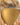 Cappuccino Motion archive wig hairline and lace detail on a smooth gold display stand