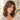 Brunette model wearing ROMY for subtle fringe and front hairline coverage