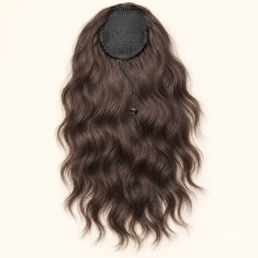 Detailed view of the ponytail attachment construction and drawstring