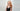 Lex after her Moxi Loxi fitting, wearing a long strawberry blonde piece, photographed on the same set.