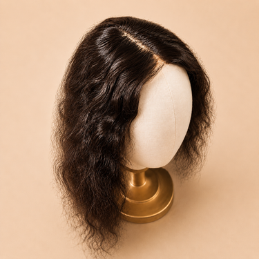 Angled view of the Moxi Loxi Lumi lace-front topper showing the natural-looking hairline and lightweight coverage.