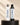Moxi Loxi Pure Care Duo with 8 oz Pure Wash and Pure Conditioner on an ivory salon pedestal