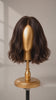Video demonstrating the Moxi Loxi Elena Swiss lace top human hair wig, highlighting the lightweight Swiss lace construction, realistic movement, and naturally seamless hairline.