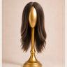 Front view of The Motion archive wig in Cool Truffle, 16 inch length, on a smooth featureless gold display head.