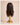 Back view of The Motion archive wig in Cool Truffle showing the finished shape, layered movement, and 16 inch length.